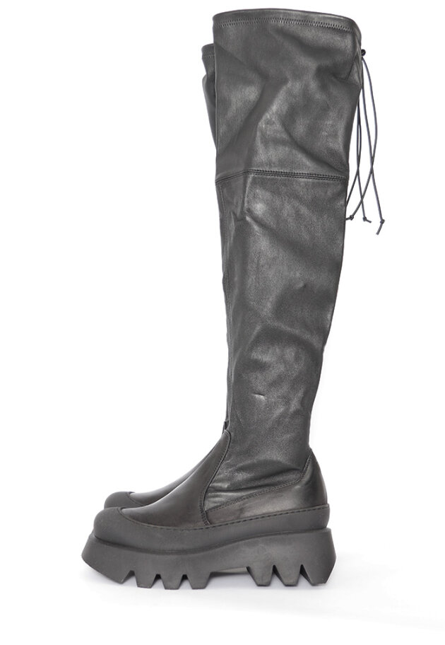 Over knee boot with stretch skin