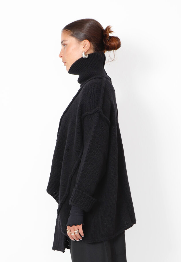 Sort Aarhus - Strikket oversize bluse i merinould