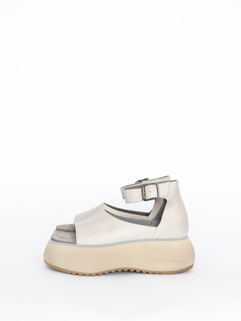 Open sandal with a buckle