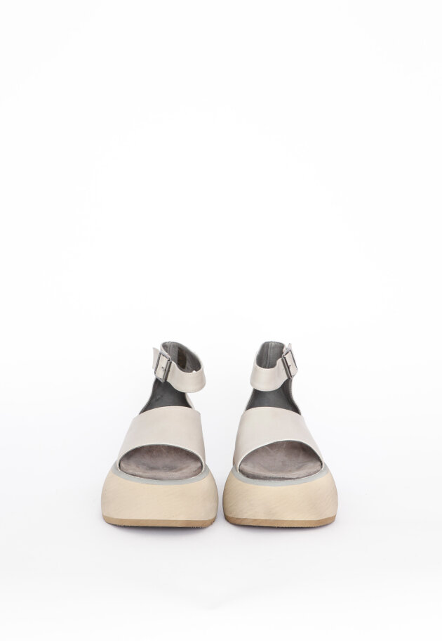 Open sandal with a buckle