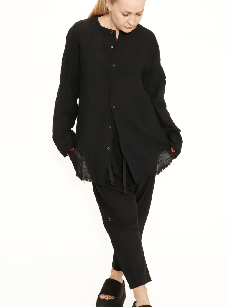 Shirt with button closure and raw edges