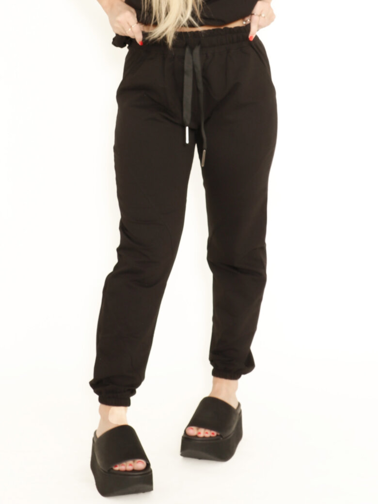 Sweat pants with elastic waist band and laces