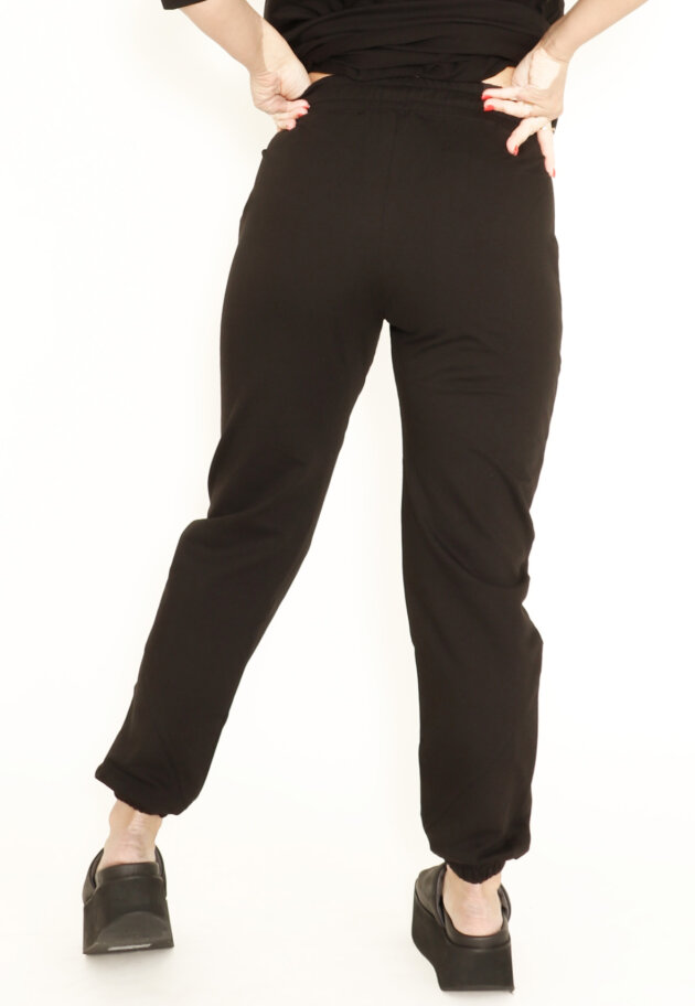 Sweat pants with elastic waist band and laces