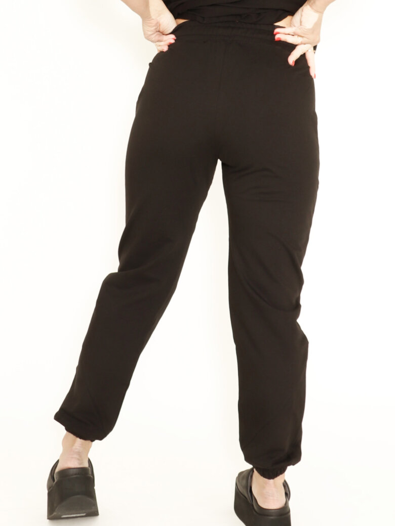 Sweat pants with elastic waist band and laces