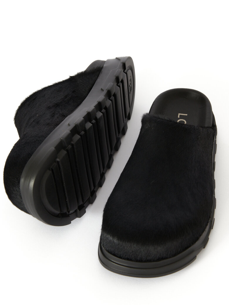 Lofina - Slippers in fur with a footbed sole