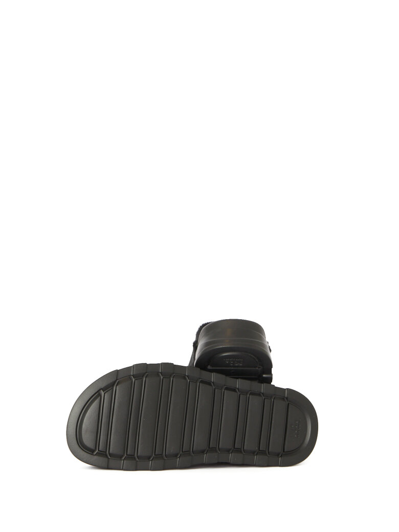 Lofina - Slippers in fur with a footbed sole