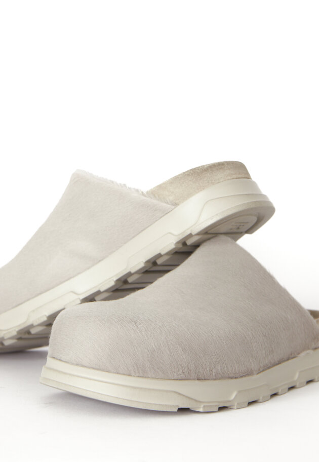 Lofina - Slight on sandal in fur with a footbed sole