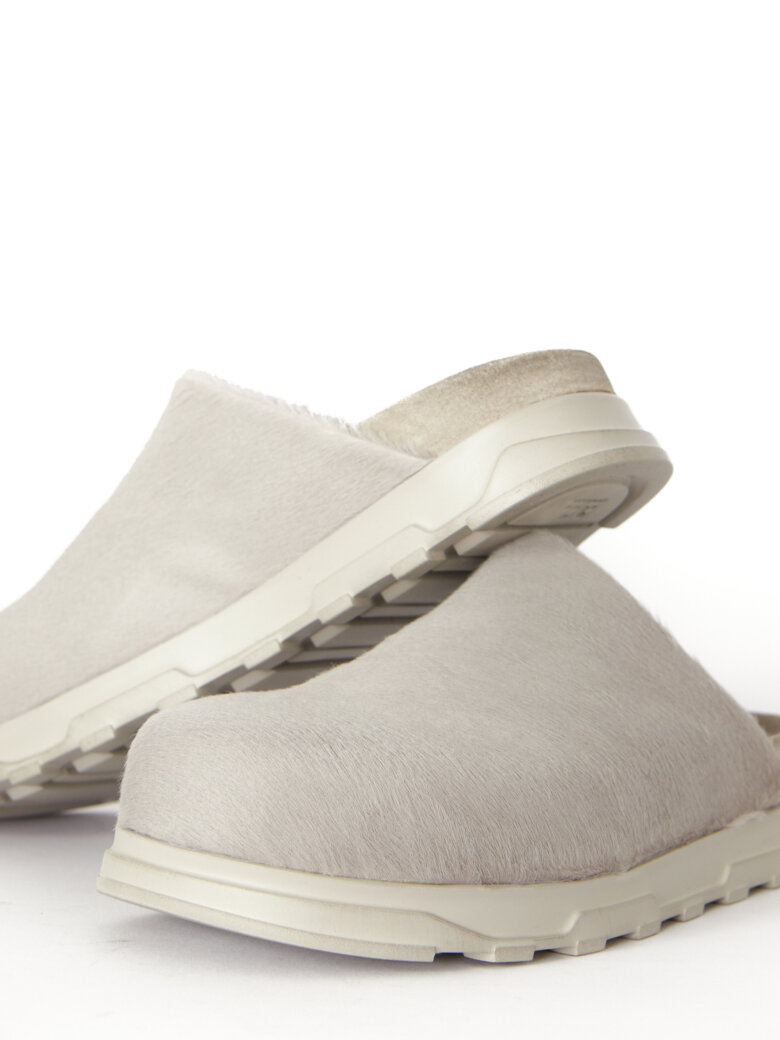 Lofina - Slight on sandal in fur with a footbed sole