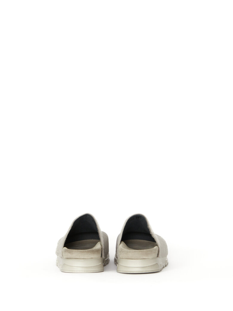 Lofina - Slight on sandal in fur with a footbed sole