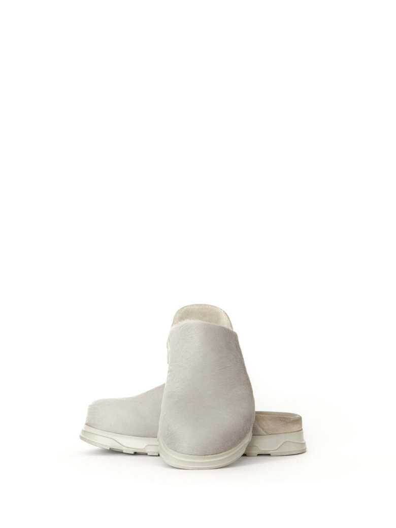 Lofina - Slight on sandal in fur with a footbed sole