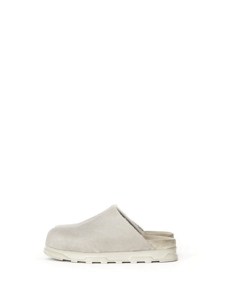 Lofina - Slight on sandal in fur with a footbed sole